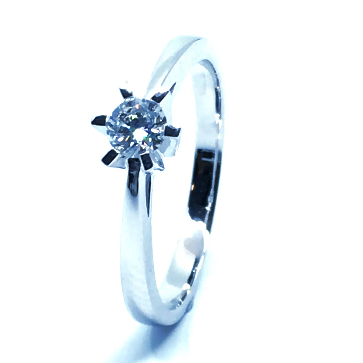 14 KT. HVIDGULD CARLA RING MED BRILLANT 0,25 CT. W/SI